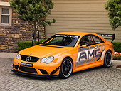 AUT 13 RK0194 02
2007 Mercedes-Benz CLK DTM 6.3 AMG Race Car Orange Coupe 3/4 Front View On Pavement