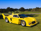 AUT 13 RK0208 02
1977 De Tomaso Pantera Class C Yellow Front 3/4 View On Grass Blue Sky
