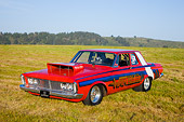 AUT 13 RK0235 01
1963 Plymouth Savoy Super Stock Dragster Red 3/4 Front View In Field