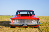AUT 13 RK0238 01
1963 Plymouth Savoy Super Stock Dragster Red Head On View In Field