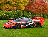 AUT 13 RK0259 01
1997 McLaren F1 GTR Longtail Red And Black 3/4 Front View On Lawn