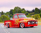 AUT 14 BK0041 01
1954 Ford F-100 Pickup Truck Hot Rod Red With Flames 3/4 Front View On Pavement By Trees