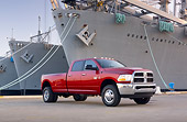 AUT 14 BK0052 01
2010 Dodge Ram 3500 Pickup Truck Red 3/4 Front View On Dock By Ships