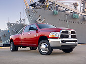 AUT 14 BK0053 01
2010 Dodge Ram 3500 Pickup Truck Red 3/4 Front View On Dock By Ships
