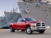 AUT 14 BK0054 01
2010 Dodge Ram 3500 Pickup Truck Red 3/4 Front View On Dock By Ships
