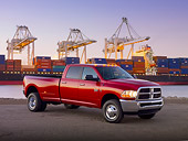 AUT 14 BK0056 01
2010 Dodge Ram 3500 Pickup Truck Red 3/4 Front View On Pavement By Shipping Yard At Dusk