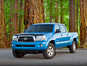 AUT 14 BK0070 01
2011 Toyota Tacoma Double Cab Pickup Truck Blue 3/4 Front View On Pavement By Redwood Trees