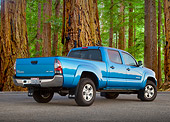 AUT 14 BK0071 01
2011 Toyota Tacoma Double Cab Pickup Truck Blue 3/4 Rear View On Pavement By Redwood Trees