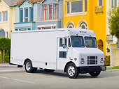 AUT 14 BK0080 01
Delivery Van White 3/4 Front View In Parking Lot By Colorful Houses