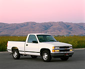 AUT 14 RK0014 05
1997 Chevrolet 1500 Full Size White 3/4 Side View On Pavement At Dusk