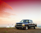 AUT 14 RK0052 02
1999 Chevy Silverado LS 1500 Blue Pick Up 3/4 Front View On Dirt Hill At Dusk