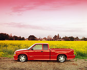 AUT 14 RK0074 04
1999 Chevrolet S-10 Extreme Pick Up Truck Red Profile In Yellow Flower Field At Dusk