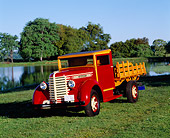 AUT 14 RK0087 08
1942 Diamond T Model 201 Truck 3/4 Front View On Grass By Water And Trees Blue Sky