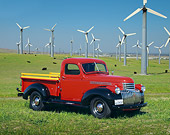 AUT 14 RK0382 04
1946 Chevy Pick Up Truck Red Side 3/4 View On Grass By Windmills