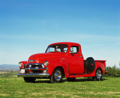 AUT 14 RK0386 09
1954 Chevy 1/2 Ton Pick Up Truck Red 3/4 Side View On Grass