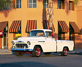 AUT 14 RK0459 02
1956 Chevy Pick Up Truck Cameo White Low 3/4 Side View On Pavement By Building