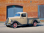 AUT 14 RK0536 11
1937 Ford Pick Up Tan 3/4 Side View On Pavement By Brick Building