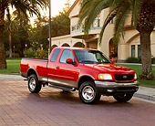 AUT 14 RK0617 01
2001 Ford F-150 4x4 Off Road Lariat Red 3/4 Front View By House And Palm Tree