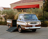AUT 14 RK0656 07
1964 Chevrolet Corvair 95 Rampside Tan And White 3/4 Front View On Pavement By Building