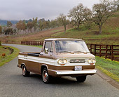 AUT 14 RK0657 04
1964 Chevrolet Corvair 95 Rampside Tan And White 3/4 Front View On Pavement By Hills And Trees