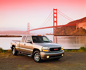 AUT 14 RK0669 03
2002 GMC Sierra Denali AWD 4 Door Pewter 3/4 Front View On Dirt By SF Bridge