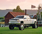 AUT 14 RK0707 03
2002 Chevrolet 3500 Duramax Diesel White 3/4 Front View On Grass By Barn