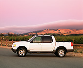 AUT 14 RK0718 05
2002 Ford Explorer Sport Trac White Profile On Pavement By Vineyard Filtered