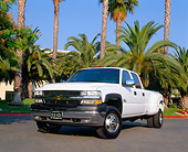 AUT 14 RK0750 01
2002 Chevy 3500 Dually Pick Up Truck White Low 3/4 Front View On Pavement By Palm Trees
