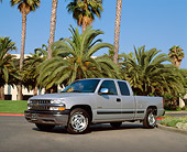 AUT 14 RK0761 02
2002 Chevy 1500 Pick Up Truck Special Factory Paint Low 3/4 Side View On Pavement By Palm Trees