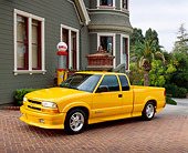 AUT 14 RK0879 03
2003 Chevrolet Extreme S10 Yellow Truck 3/4 Side View On Pavement By House