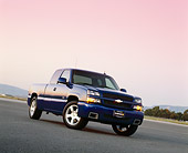 AUT 14 RK0898 01
2004 Chevrolet SS 1500 Extended Cab Blue Slanted Low 3/4 Front View On Pavement Filtered