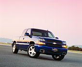 AUT 14 RK0898 03
2004 Chevrolet SS 1500 Extended Cab Blue Slanted Low 3/4 Front View On Pavement Filtered