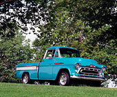 AUT 14 RK0999 01
1957 Chevy Cameo Pick Up Truck Turquoise 3/4 Side View On Grass