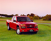AUT 14 RK1030 01
2004 Chevrolet Colorado LS Extended Cab Red 3/4 Front View On Grass