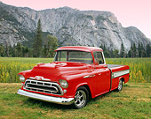 AUT 14 RK1048 02
1957 Chevrolet Cameo Red And White 3/4 Front View On Grass By Mountain