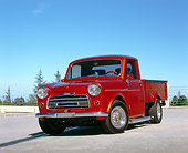 AUT 14 RK1109 01
1959 Datsun 1000 Orange Pick Up Truck 3/4 Front View On Pavement