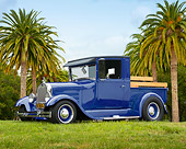 AUT 14 RK1142 01
1928 Ford Model A Pick Up Truck Blue 3/4 Side View On Grass By Palm Trees