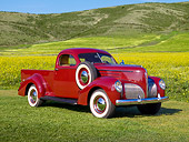 AUT 14 RK1224 01
1939 Studebaker Coupe Express Cabernet 3/4 Front View On Grass By Wildflowers And Hills