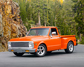 AUT 14 RK1384 01
1972 GMC 1/2 Ton Pickup Truck Orange 3/4 Front View On Pavement In Forest