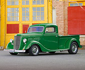 AUT 14 RK1421 01
1935 Ford Pickup Truck Green 3/4 Front View On Pavement By Brick Building