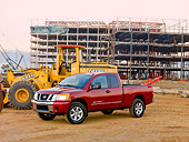 AUT 14 RK1427 01
2009 Nissan Titan 4x4 SE Pickup Truck Red 3/4 Front View On Dirt By Construction Equipment