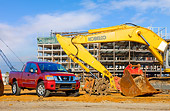AUT 14 RK1429 01
2009 Nissan Titan 4x4 SE Pickup Truck Red 3/4 Front View On Dirt By Construction Equipment