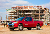 AUT 14 RK1431 01
2009 Nissan Titan 4x4 SE Pickup Truck Red 3/4 Front View On Dirt By Construction