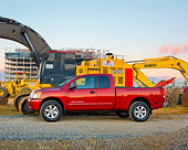 AUT 14 RK1435 01
2009 Nissan Titan 4x4 SE Pickup Truck Red Profile View On Dirt By Construction Equipment