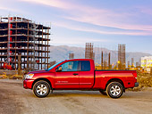 AUT 14 RK1436 01
2009 Nissan Titan 4x4 SE Pickup Truck Red Profile View On Dirt By Construction