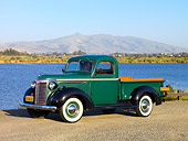 AUT 14 RK1526 01
1940 Chevrolet Pickup Truck Green 3/4 Front View On Gravel By Lake