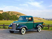 AUT 14 RK1529 01
1940 Chevrolet Pickup Truck Green 3/4 Front View On Gravel By Hills