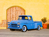 AUT 14 RK1534 01
1958 Chevrolet Apache Pickup Truck Blue 3/4 Front View On Gravel By Building