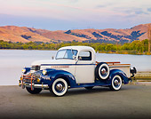 AUT 14 RK1550 01
1946 Chevrolet 1/2 Ton Pickup Truck White And Blue 3/4 Front View On Pavement By Lake