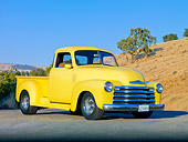 AUT 14 RK1555 01
1950 Chevrolet Pickup Truck Yellow 3/4 Front View On Pavement By Hills